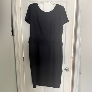 Navy short sleeve lined dress.  Below knee length.